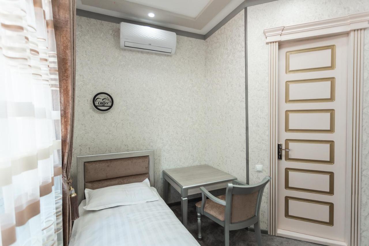 Diyor Hotel Marghilon Exterior foto