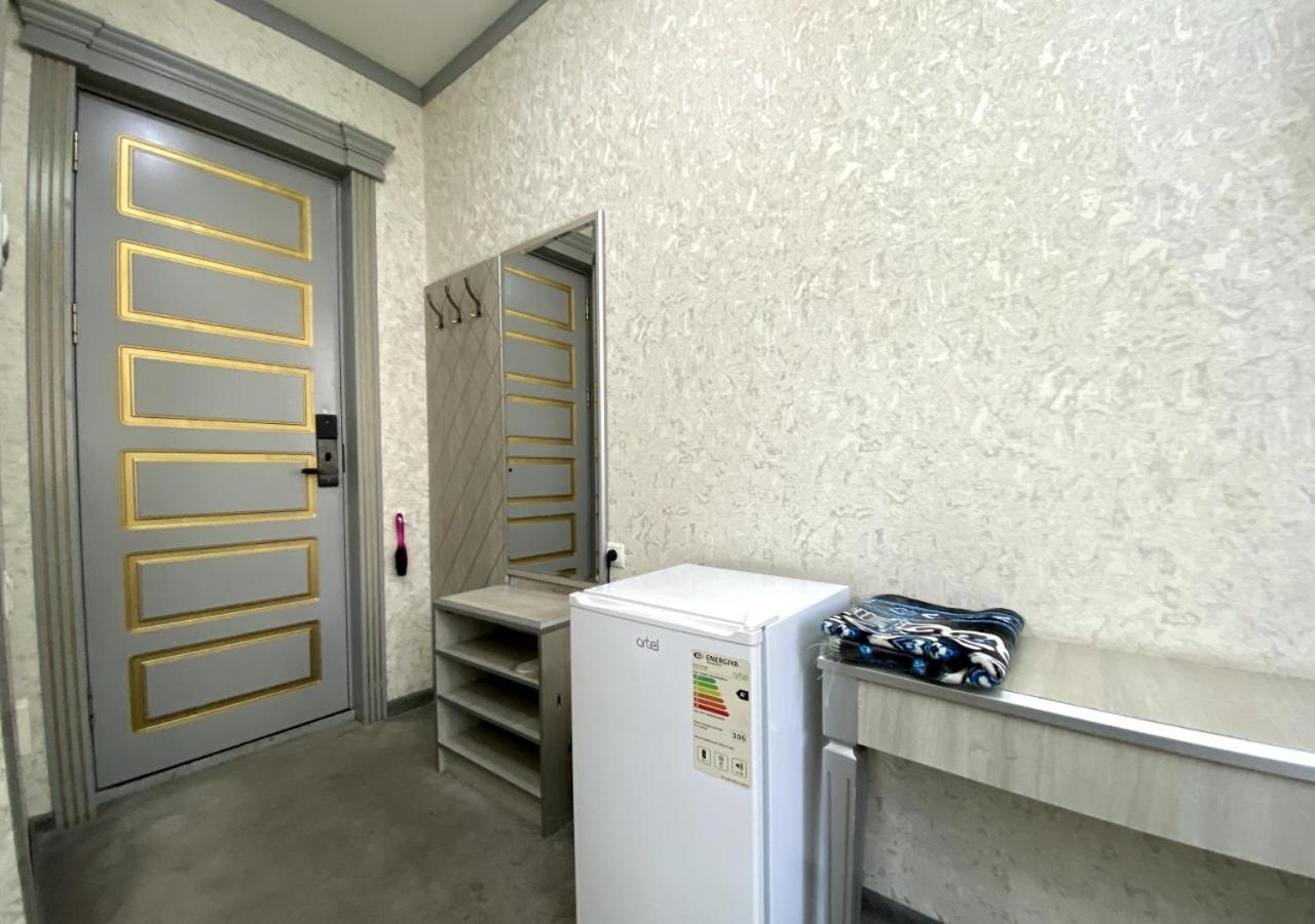 Diyor Hotel Marghilon Exterior foto